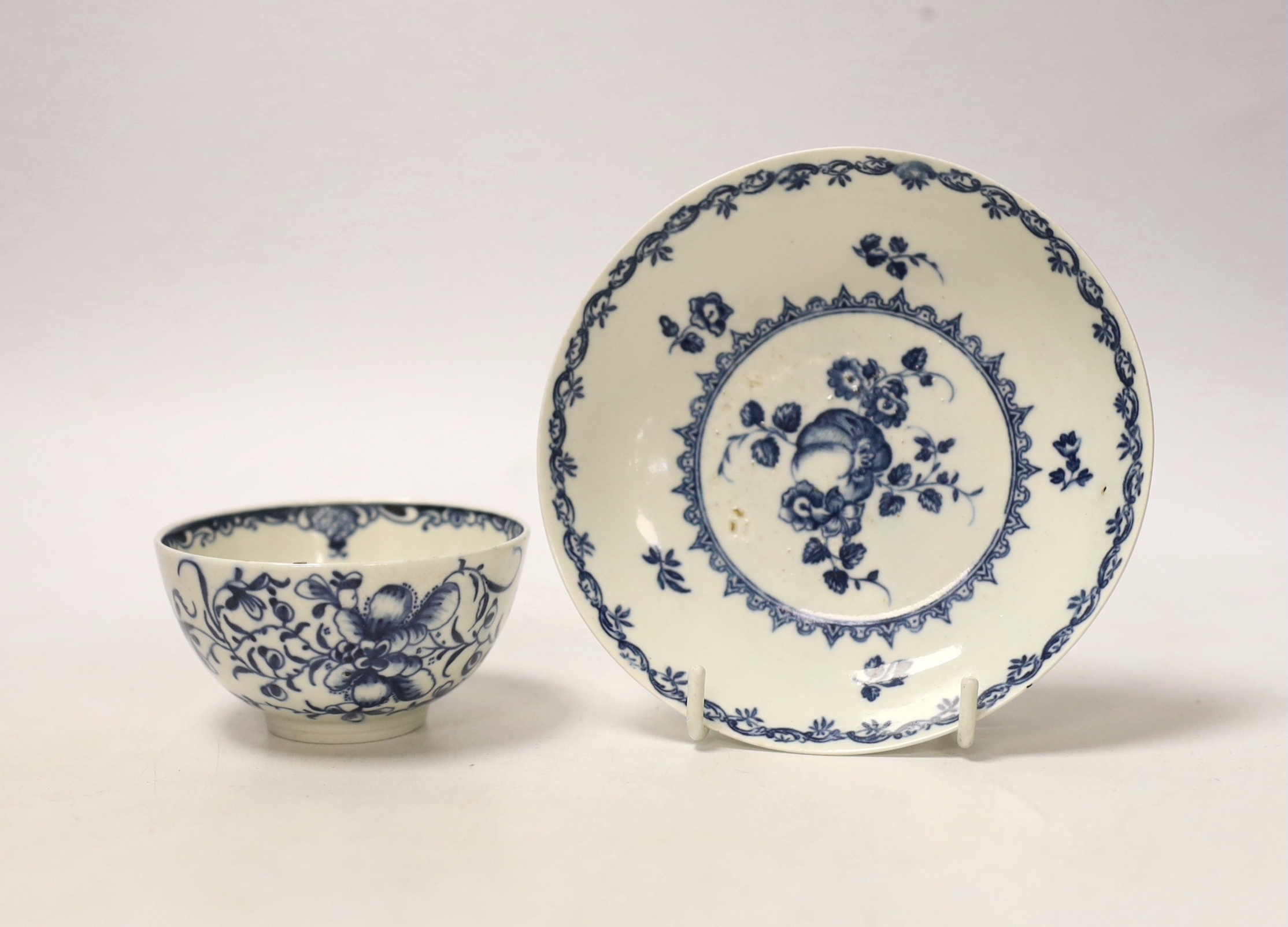 A Worcester tea bowl, Mansfield pattern and a saucer, Fruit and Flower pattern